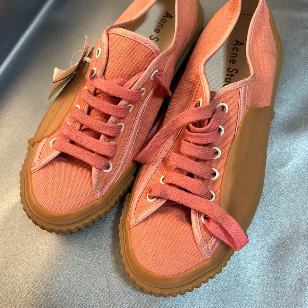 New Acne Studios, salmon pink sneakers.